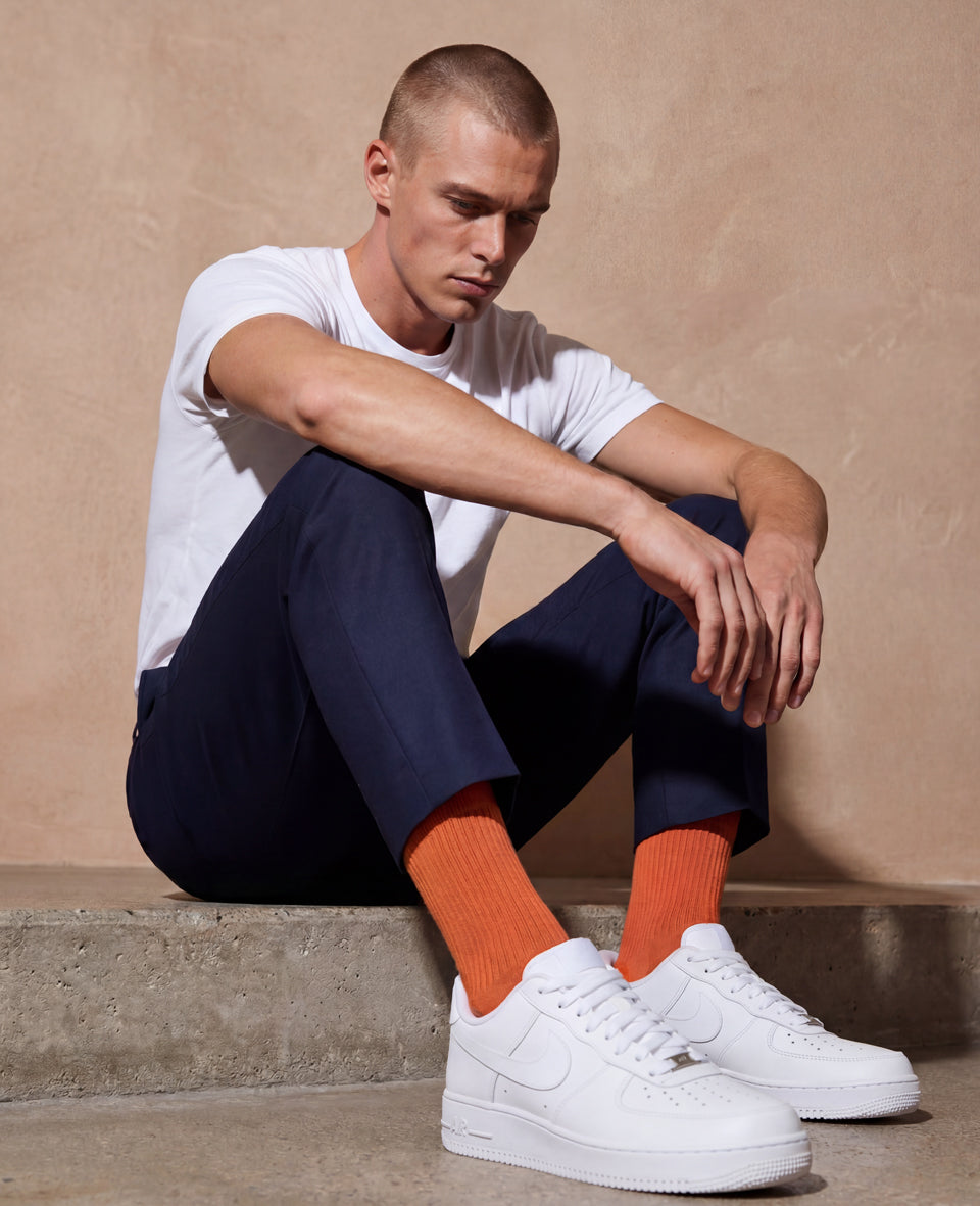 Discover why orange socks are the menswear statement of 2026. 200-needle organic cotton, hand-linked toe, designed in Copenhagen. Shop the Summer 2026 drop.